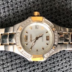 Seiko gold and silver tone watch with diamond accents